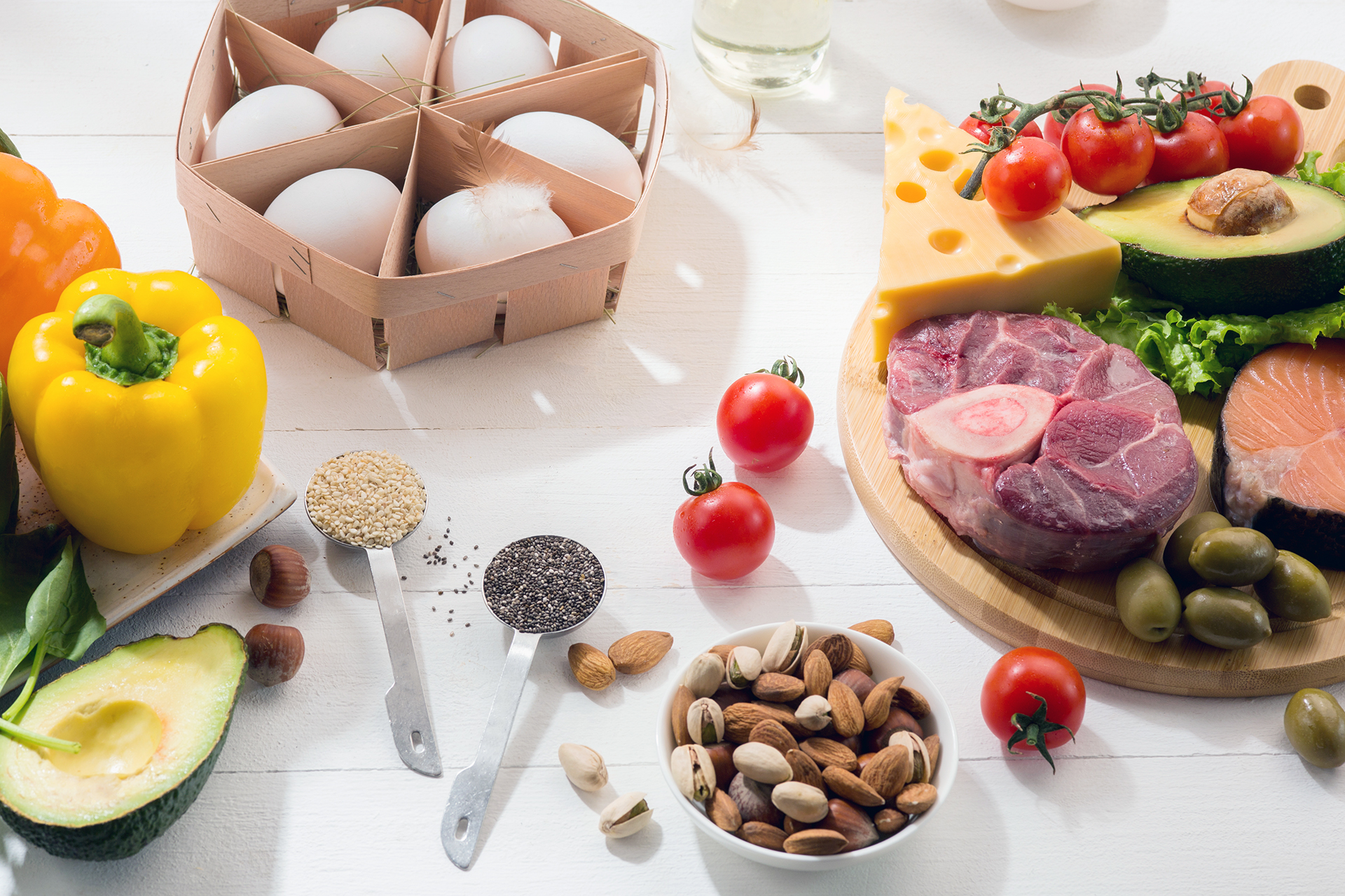 Ketogenic low carbs diet - food selection on white background